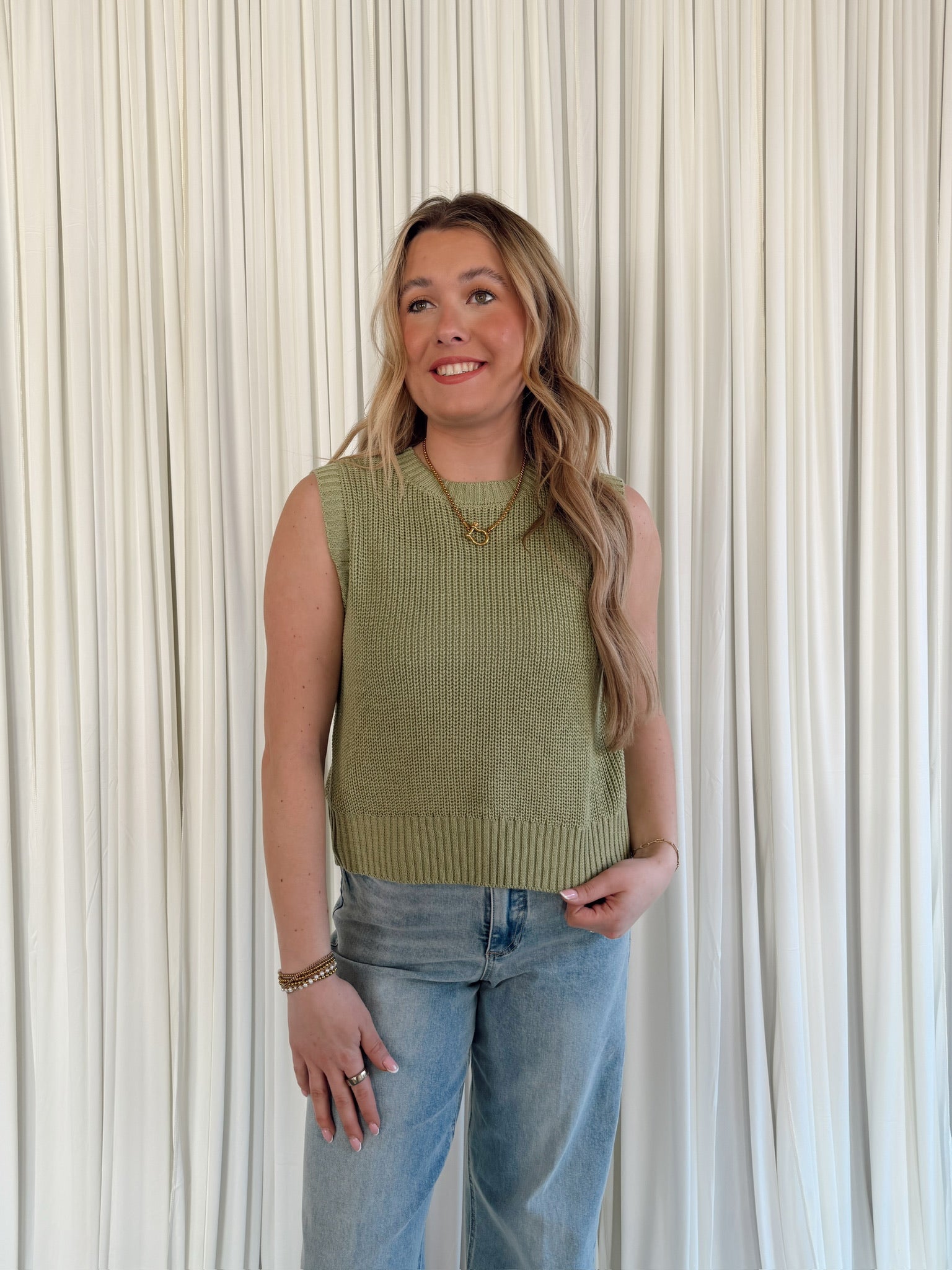 Sleeveless Sweater With Open Back