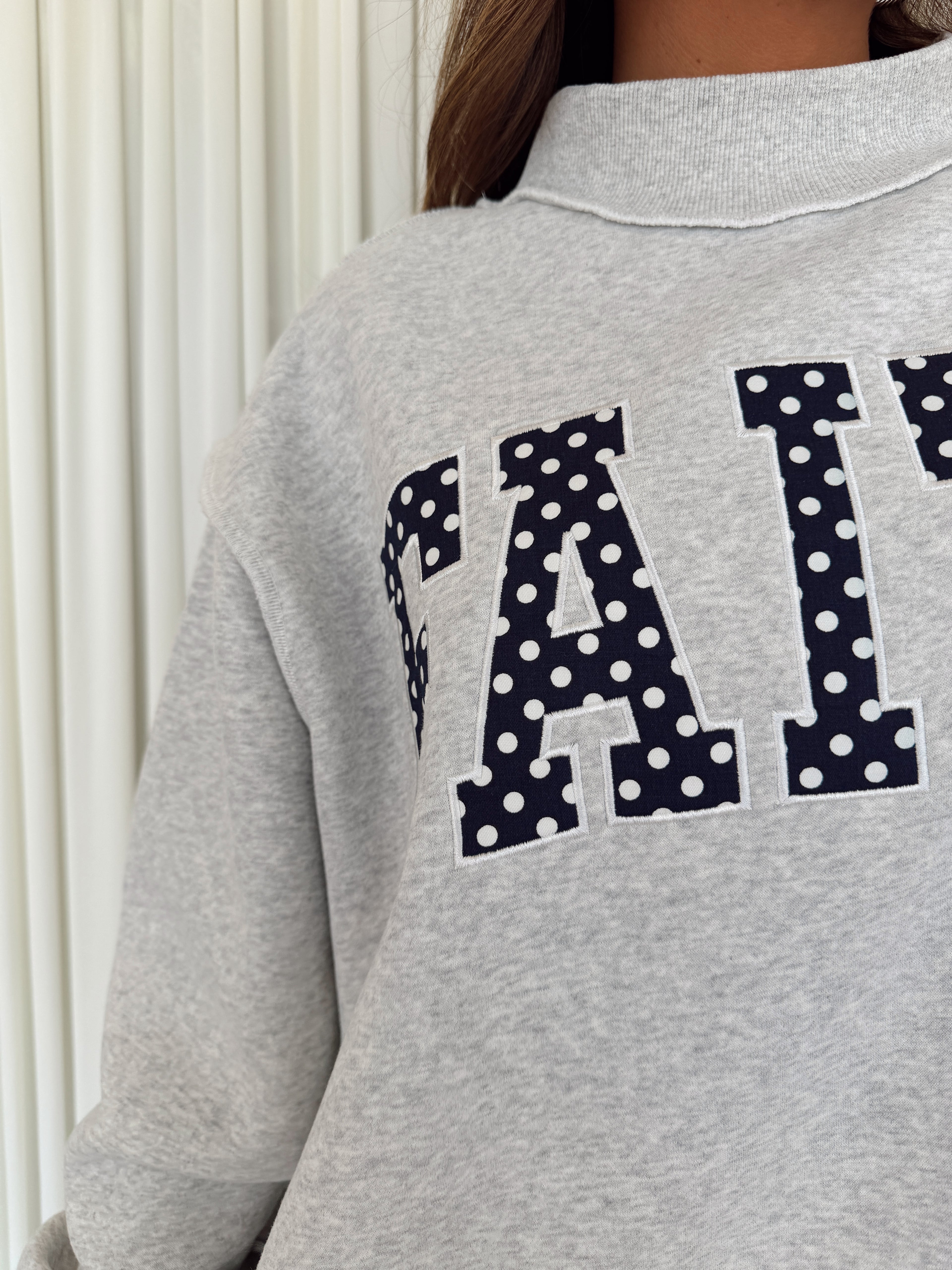 Polka-Dot Mock Neck Sweatshirt